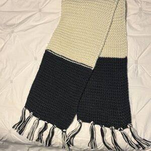Stylish Black and White Knit Scarf with Fringe